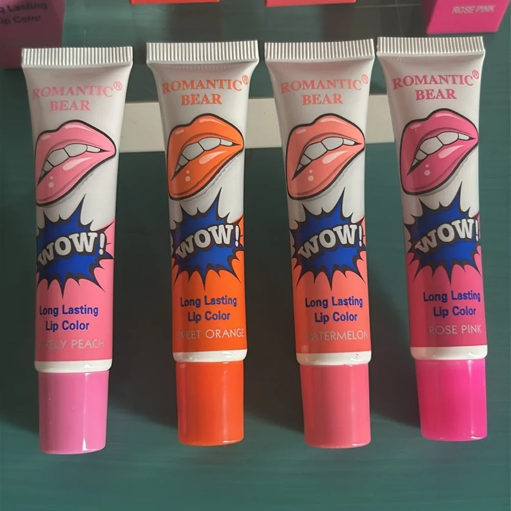 New in Box 4 Piece Assorted Multi-Color Long Lasting Peel Off Lip Stain Set